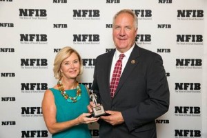 Juanita Duggan, President and CEO of NFIB, presents Congressman Shimkus with the Guardian of Small Business Award for the 114th Congress.